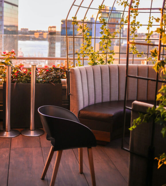 Seating booth with garden on a rooftop